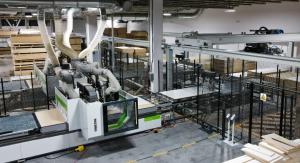 The Winstore line feeds the Biesse RoverB CNC machining center.