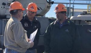 Workers discuss renovation