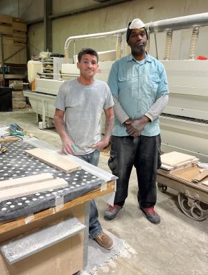 Tony Bowen and Leroy Johnson are recent graduates of Next Step who were hired by TMC Furniture.