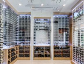 Dacor - When John McClain Design designed this beverage center he knew that  the Dacor WineStation would be the main focal point. With custom cabinetry  surrounding it, the Wine Station is definitely