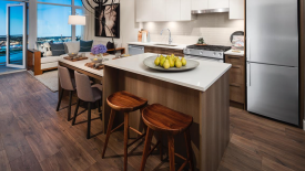 A kitchen in a condominium in The Columbia at Brewery District building development.
