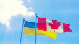 canada and ukrainian flags