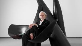 Wendell Castle seated in sculpture