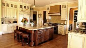 spencer-cabinetry-biscuit-painted-cabinetry-with-cherry-island.jpg