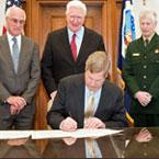 145_weeks-act-signing.jpg 145_weeks-act-signing.jpg
