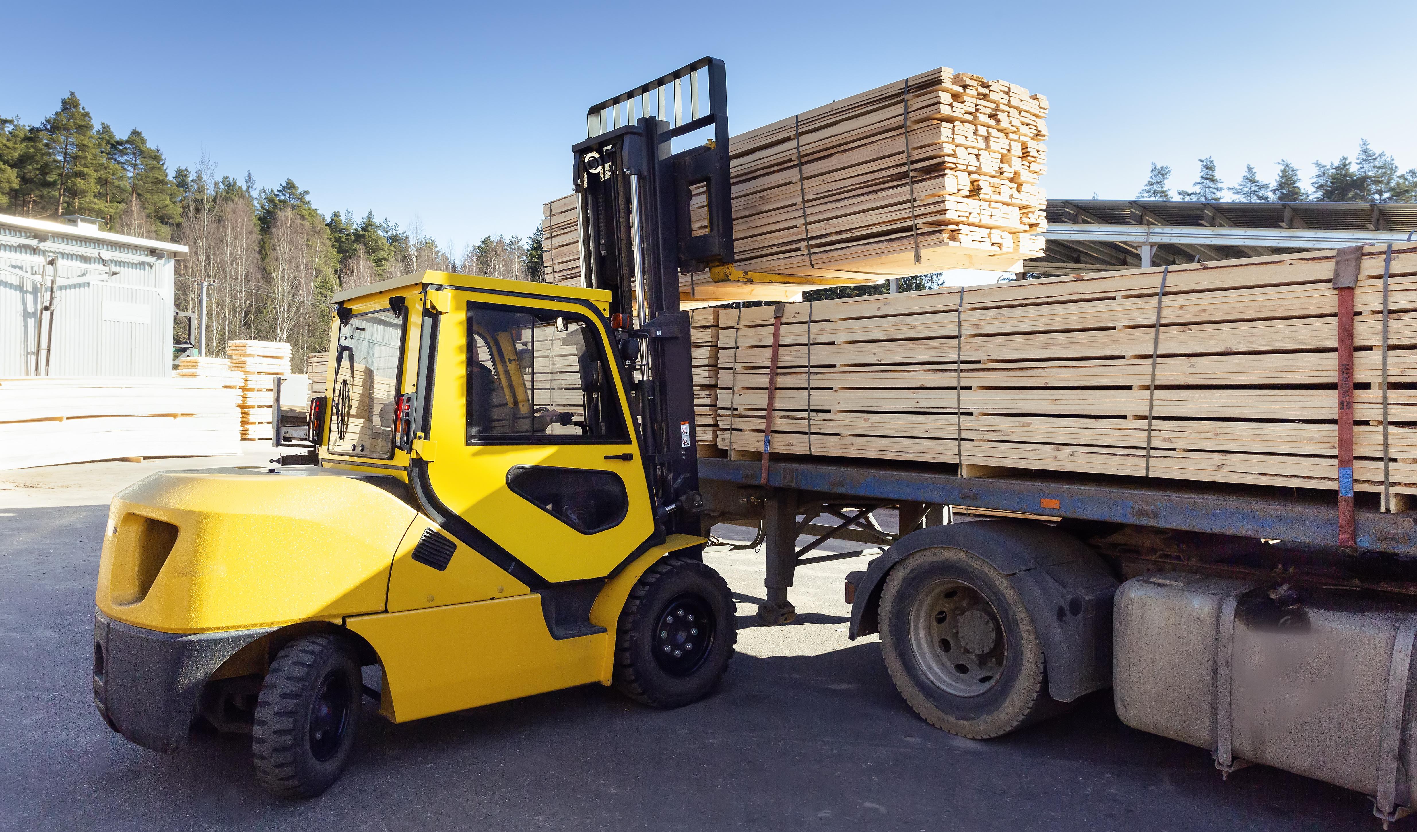 Forklift loading lumber