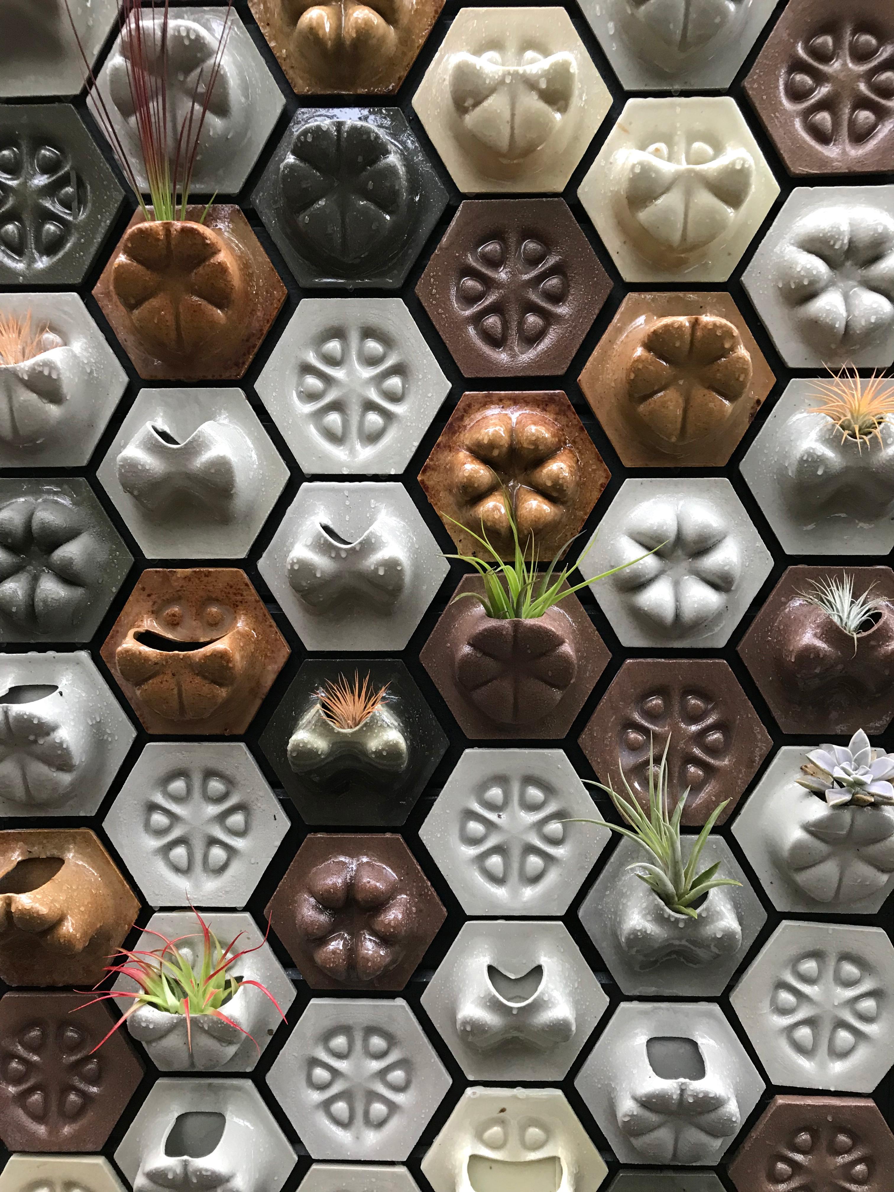 3D printed wood wall tiles.