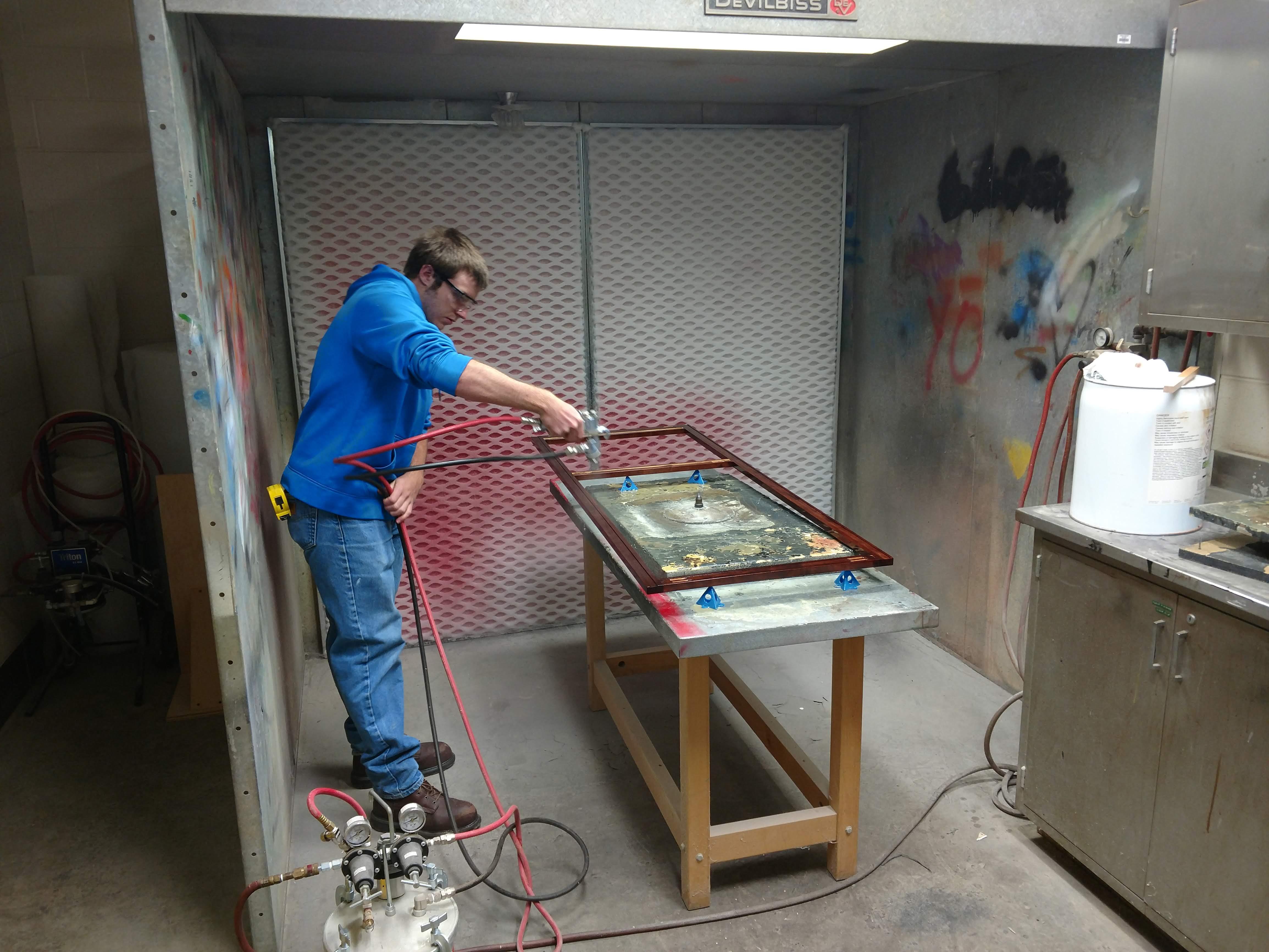 reed-custer-accessa-spraying.jpg