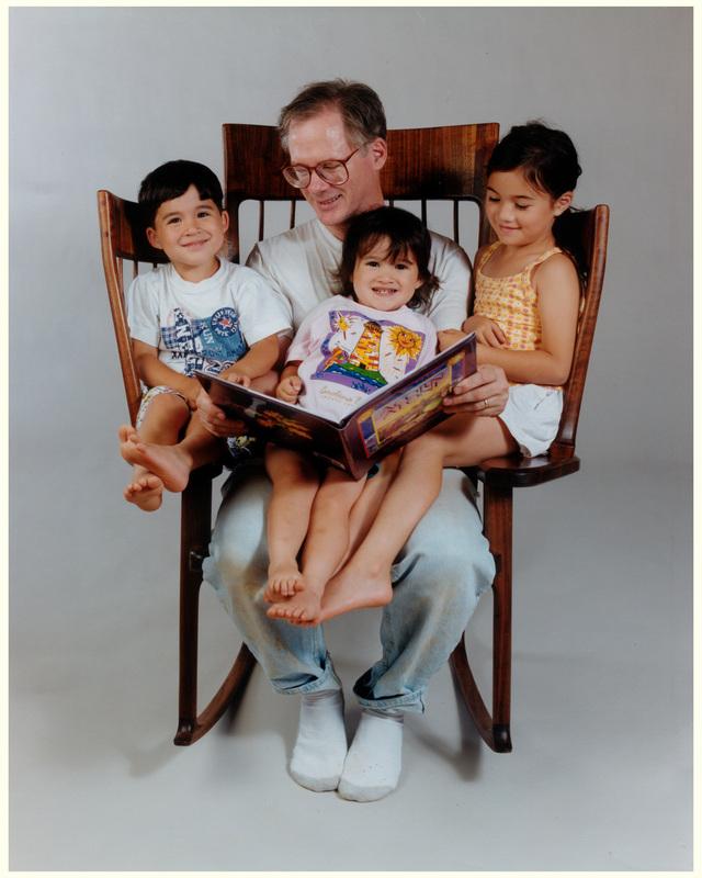 Dad builds three seat rocking chair to read to his kids at once